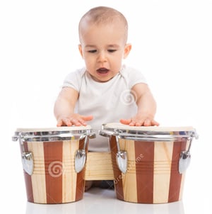kid playing bongo drum-1