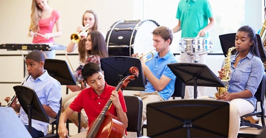 teenagers playing instruments