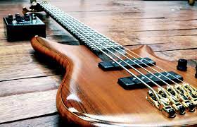 Electric guitar on wooden table free image download
