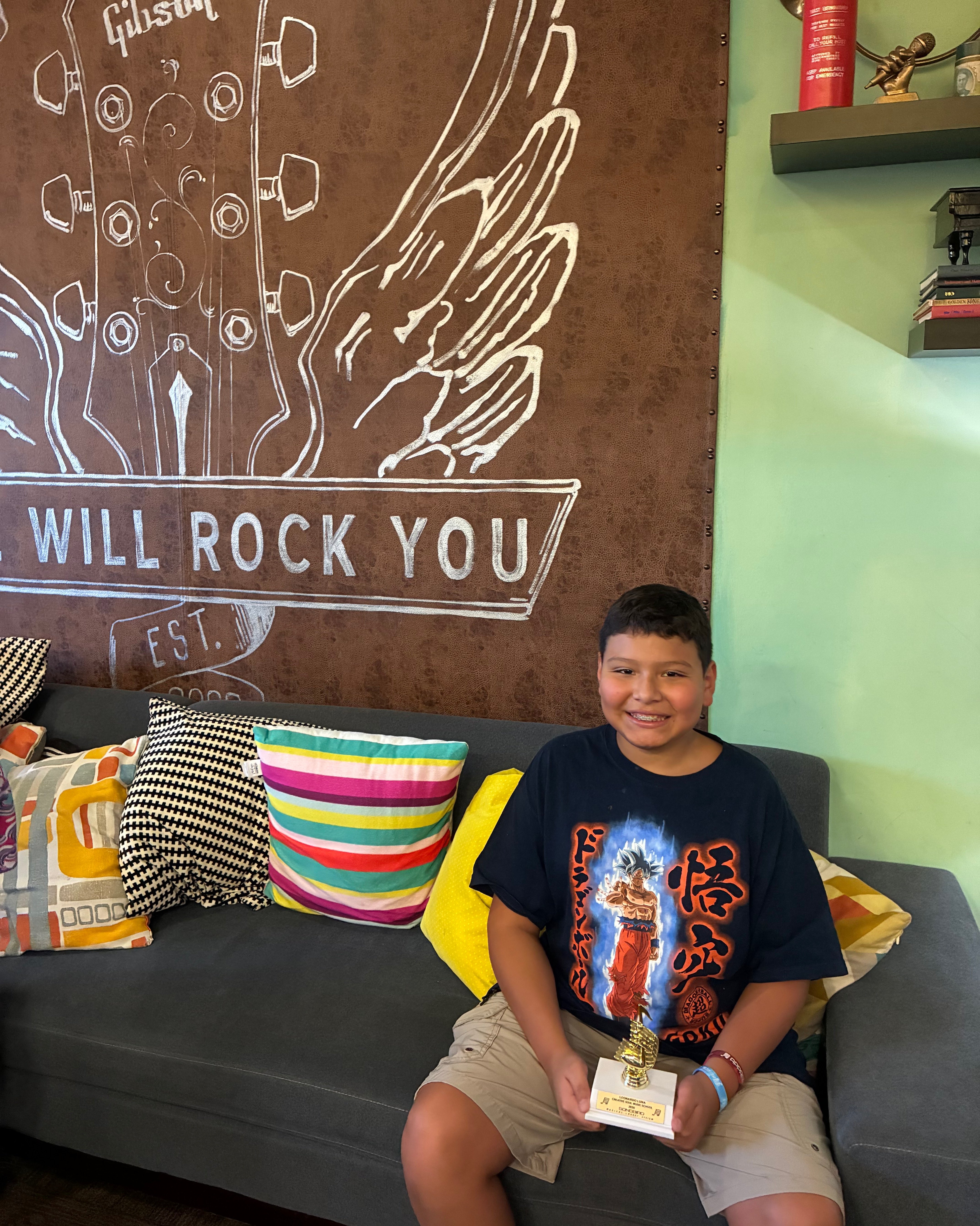Creative Soul Music School student celebrating music learning