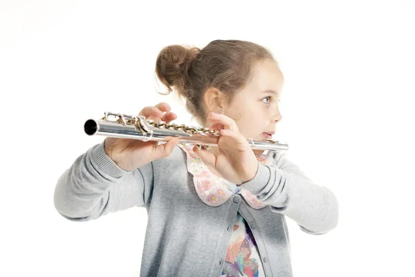 depositphotos_47309587-stock-photo-young-girl-playing-flute